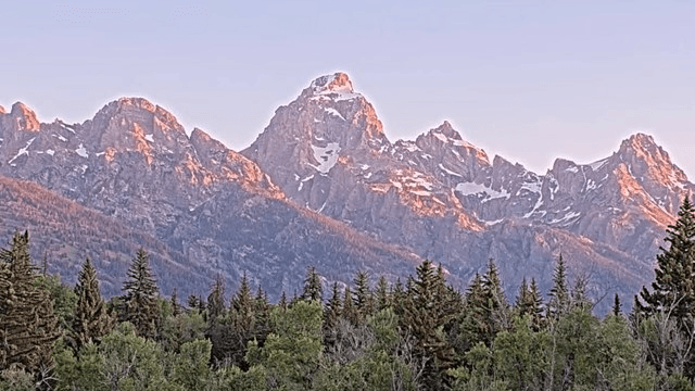 Raw webcam view of the Grand Tetons at sunrise